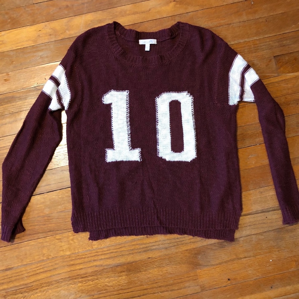 Delia’s number maroon sweater
